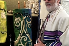 Bob Gumson with the Torahs