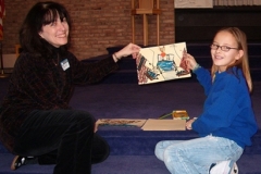 Rabbi Rena with kid on Mitzvah Day 2018