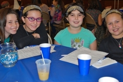 byachad girls smiling at table