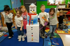 ecec kids with carboard snowperson