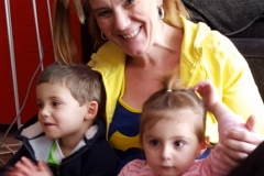 ecec teacher with kids in lap crazy hair day